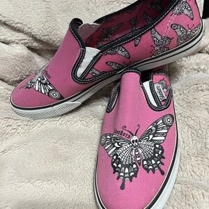 10 Skechers Pink Slip-On Sneakers with Skull Butterfly Design